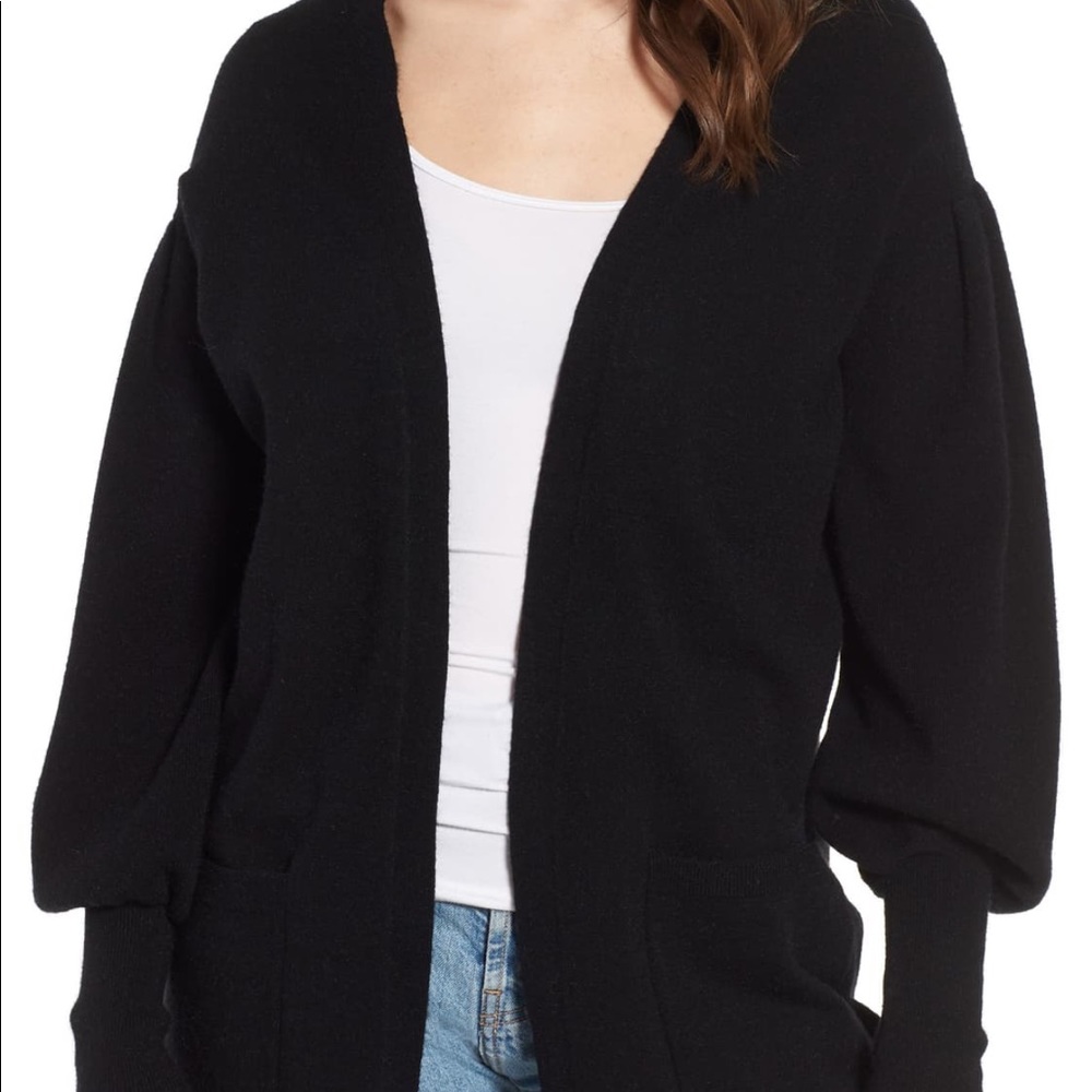 Dropped shoulders and balloon sleeve cardigan.